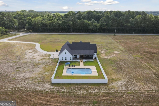 2879 Lakeview Rd, Statesboro, GA 30461 - view from above of property featuring a pool and a heavily wooded area