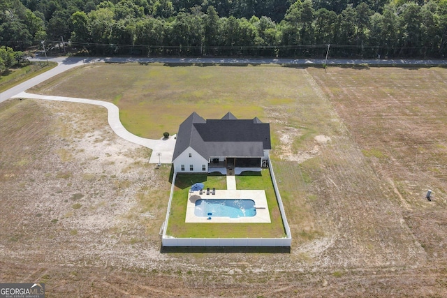 2879 Lakeview Rd, Statesboro, GA 30461 - aerial view of property and surrounding area featuring a forest and a pool