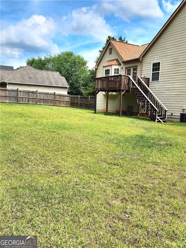 view of yard with a deck