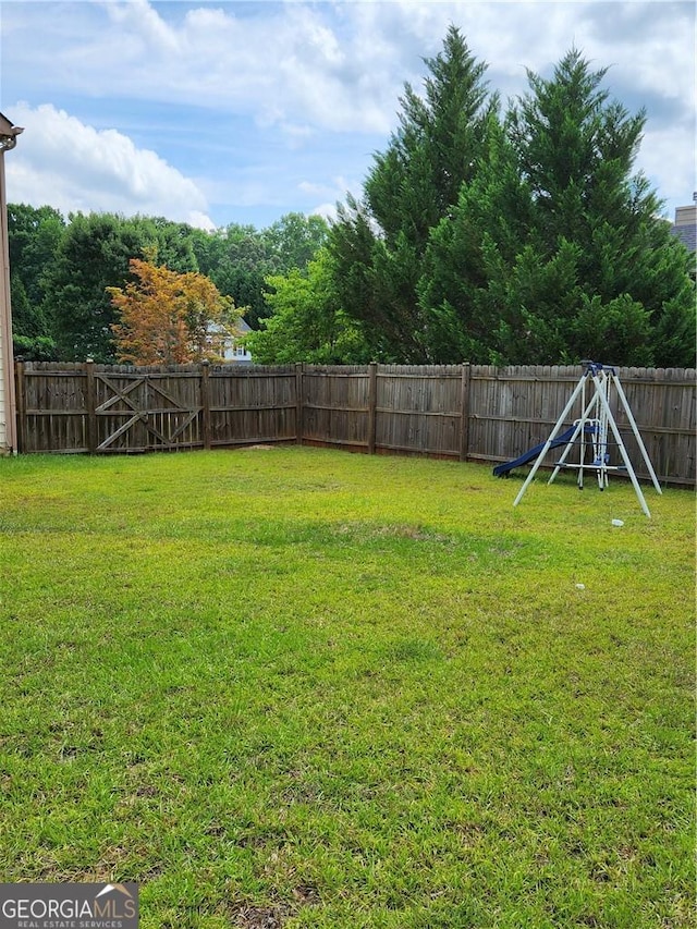 view of yard featuring a playground