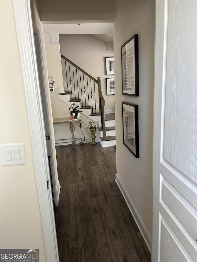 corridor with dark wood-type flooring