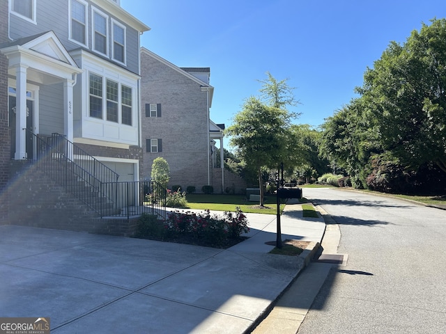 view of side of property featuring a garage