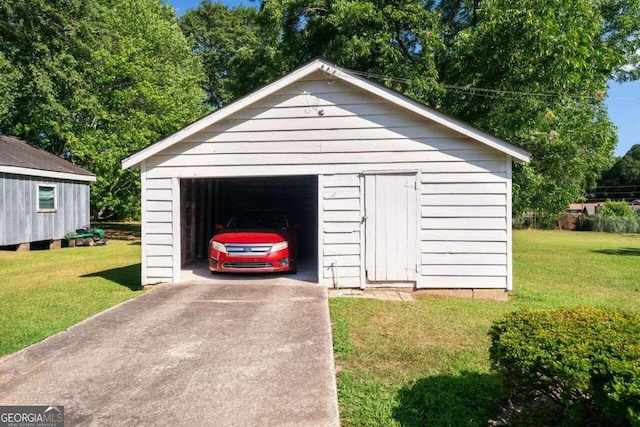 garage with a lawn