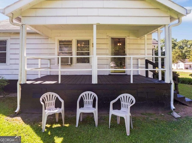 rear view of house with a deck