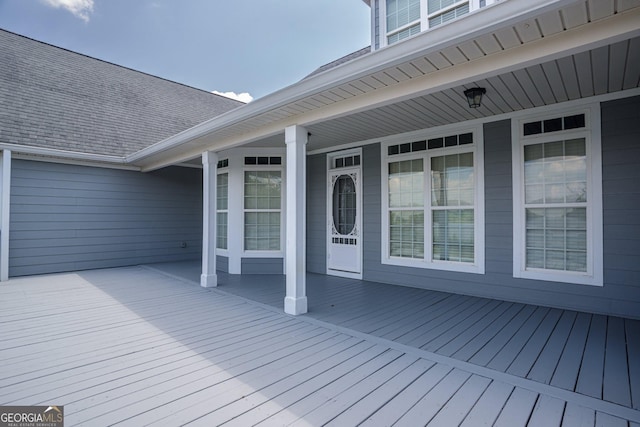 wooden deck featuring a porch