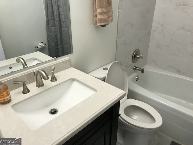 full bathroom with vanity, toilet, and shower / tub combo