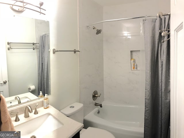 full bathroom with shower / tub combo with curtain, toilet, and vanity