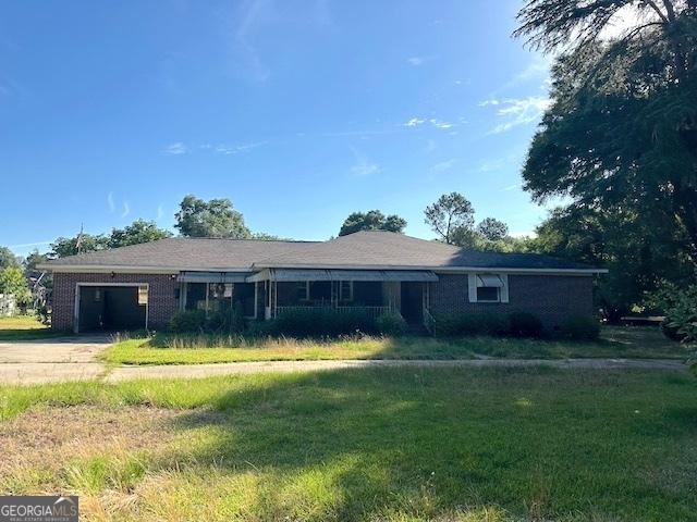151 Lorrie St, Sardis, GA 30456 - ranch-style home featuring a garage and driveway