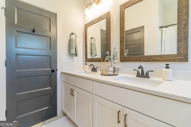 bathroom with dual vanity