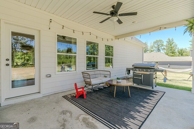 view of patio / terrace featuring ceiling fan and a grill