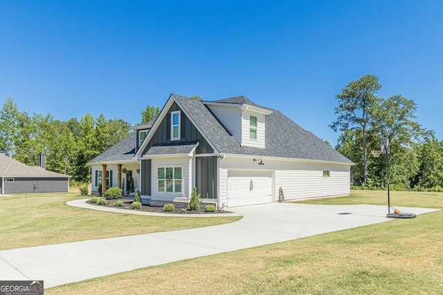 view of front facade featuring a garage and a front yard