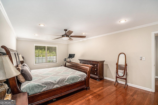 bedroom featuring ceiling fan, ornamental molding, and dark wood-type flooring