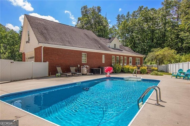 view of pool with a patio area