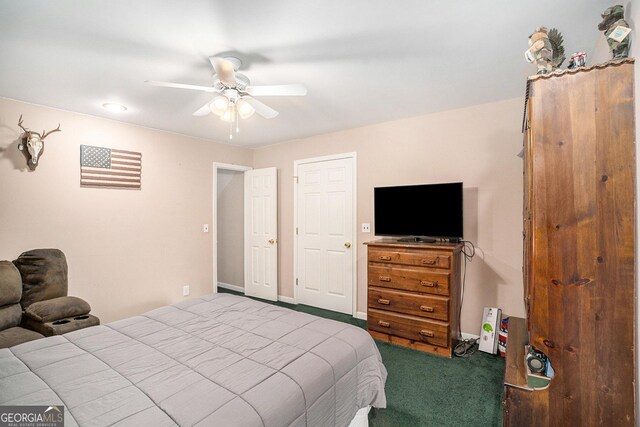 carpeted bedroom featuring ceiling fan