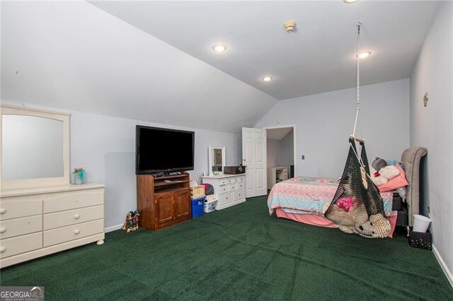 bedroom featuring carpet and lofted ceiling