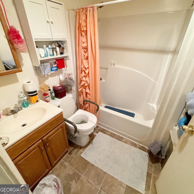 full bathroom featuring tile patterned flooring, toilet, vanity, and shower / bath combination with curtain