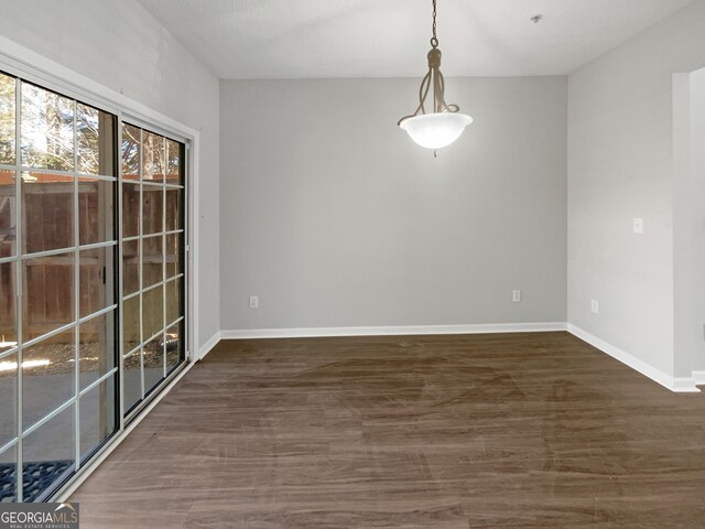 stairway with hardwood / wood-style floors