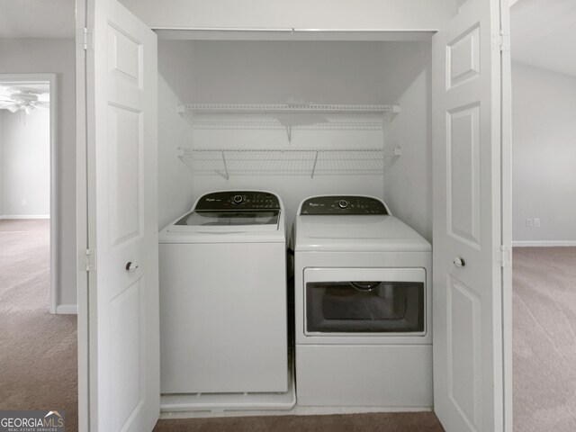 unfurnished bedroom featuring connected bathroom, light carpet, and ceiling fan