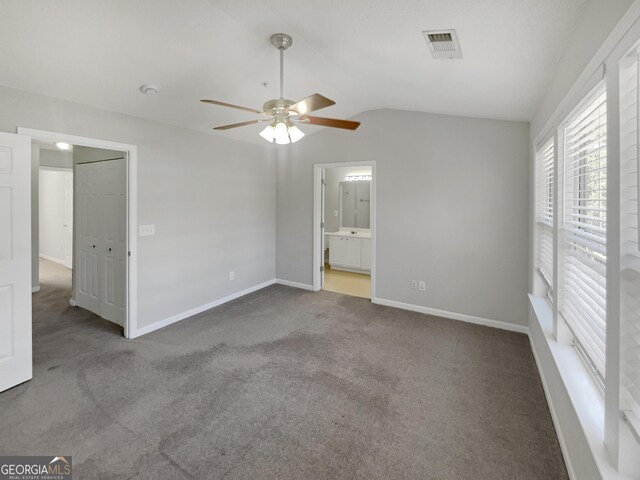 walk in closet featuring carpet flooring