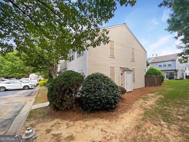 view of home's exterior featuring a yard