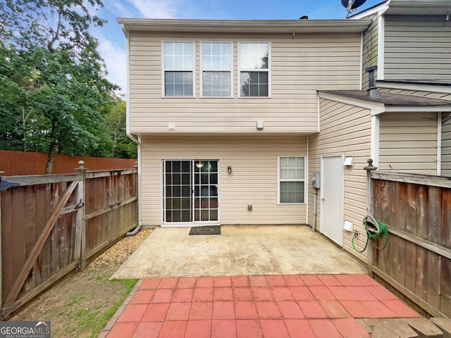 rear view of property with a patio