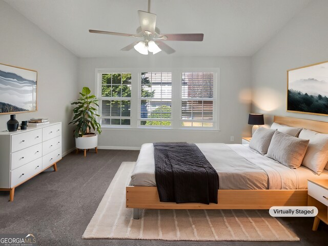 unfurnished living room with dark hardwood / wood-style flooring, a fireplace, and ceiling fan