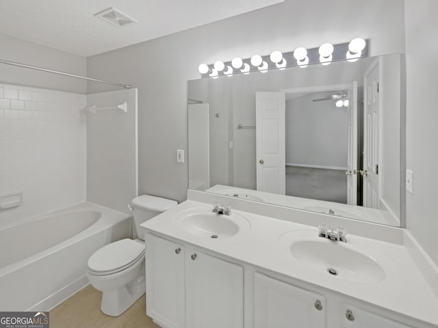 full bathroom featuring ceiling fan, toilet, visible vents, and a sink