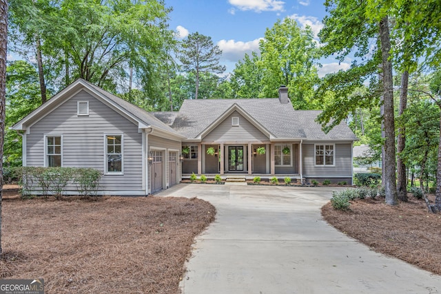 ranch-style home featuring a garage