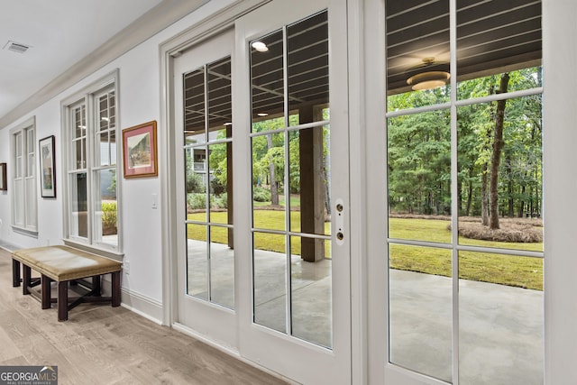 doorway to outside with hardwood / wood-style floors