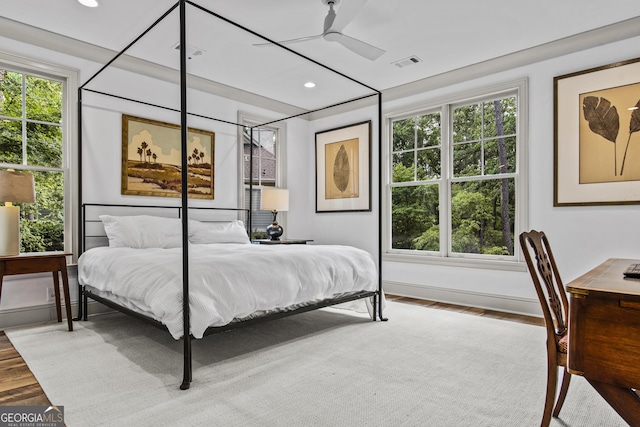 bedroom featuring ceiling fan and wood-type flooring