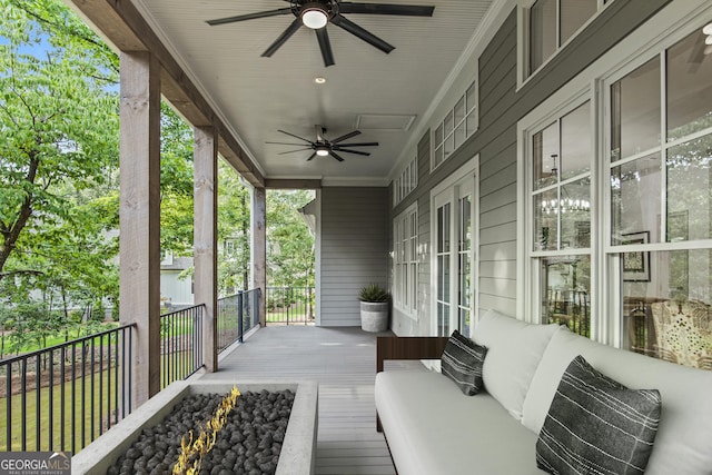 exterior space with ceiling fan and covered porch