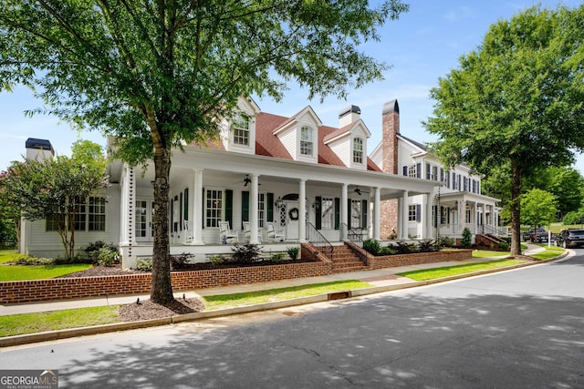 cape cod house with covered porch