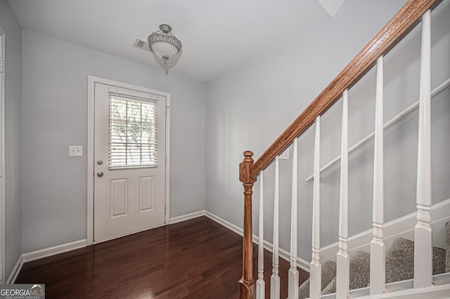 entrance foyer featuring dark wood-type flooring