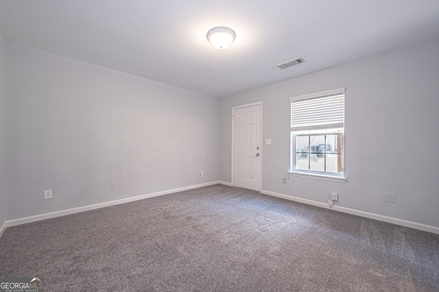 empty room with carpet floors