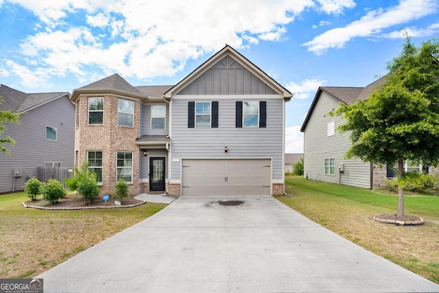 view of front of house with a garage and a front yard