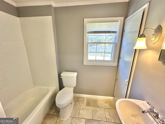 bathroom with crown molding, tile patterned flooring, sink, and toilet