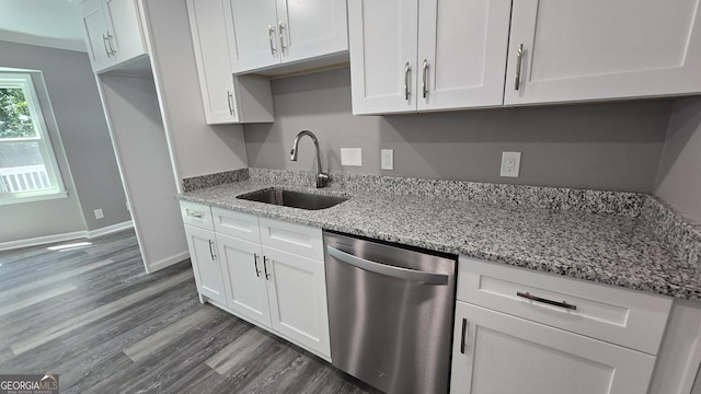 kitchen featuring a sink, dark wood-style floors, white cabinetry, and dishwasher