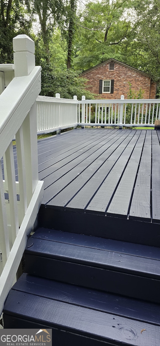 5124 Smoke Rise Dr, Macon, GA 31210 - wooden deck with view of wooded area
