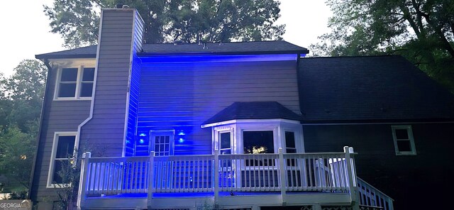 5124 Smoke Rise Dr, Macon, GA 31210 - rear view of house featuring a wooden deck and a chimney