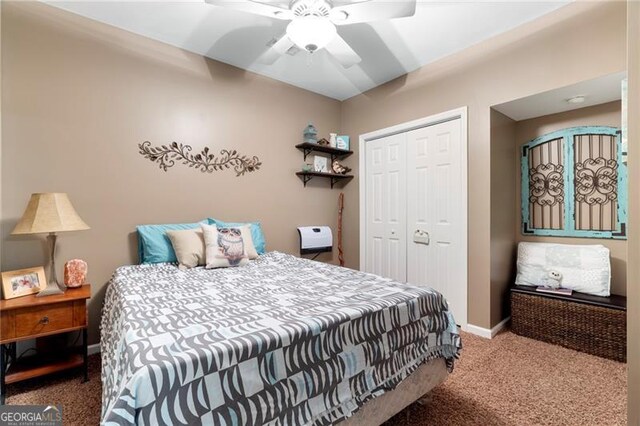 bedroom featuring carpet flooring, a closet, and ceiling fan