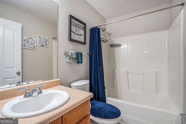 full bathroom featuring vanity, a textured ceiling, toilet, and shower / tub combo with curtain