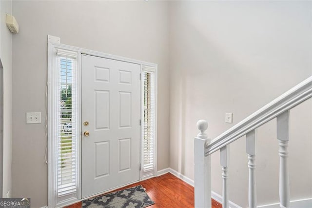 foyer entrance with wood-type flooring