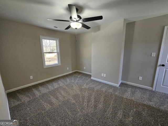 carpeted empty room with ceiling fan