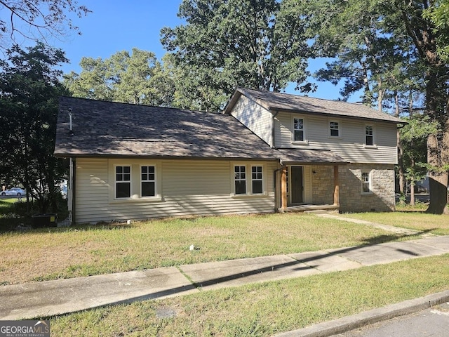 view of front property with a front lawn