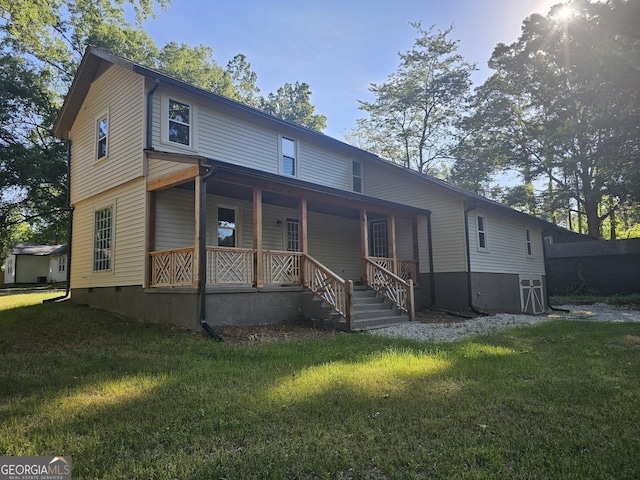 view of front of home with a porch and a front yard