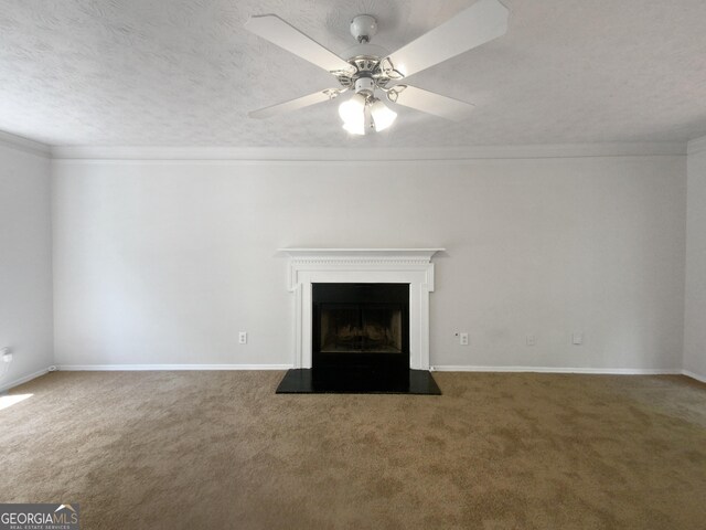 unfurnished living room with crown molding, ceiling fan, a textured ceiling, and dark colored carpet