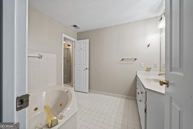 bathroom featuring tile patterned floors, vanity, and plus walk in shower