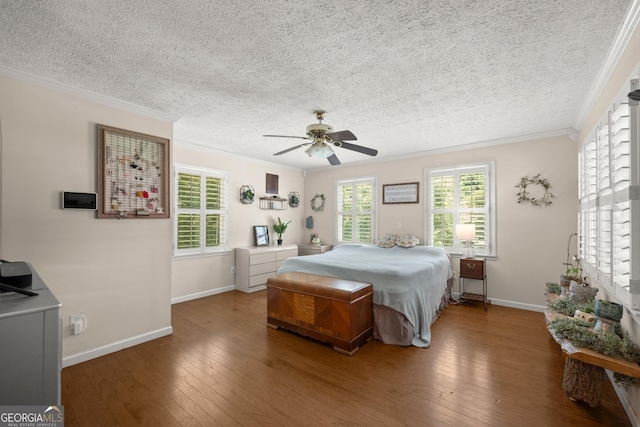 bedroom with ceiling fan, crown molding, and wood-type flooring