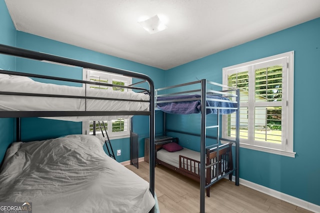 bedroom with light hardwood / wood-style flooring