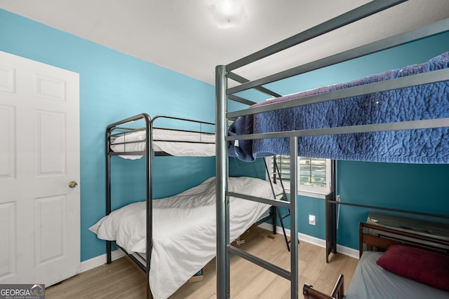 bedroom featuring wood-type flooring